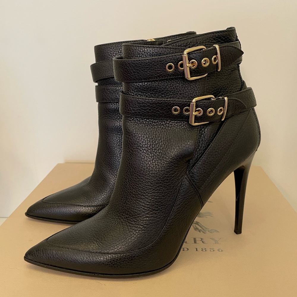 Burberry size 40. Like new. Worn only once. Great buy.